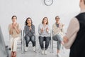 happy multicultural businesswomen applauding to speaker Royalty Free Stock Photo