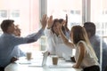 Happy multicultural executive team people give high five celebrate success Royalty Free Stock Photo