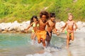 Happy multiethnic kids having fun at the seaside Royalty Free Stock Photo