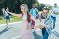 happy multiethnic teenage friends having fun together