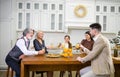 Happy multigenerational family celebrating birthday of little girl in kitchen