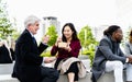 Happy multiracial business people having a lunch break outside the office Royalty Free Stock Photo