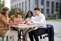 Business team having lunch at outdoor cafe Royalty Free Stock Photo