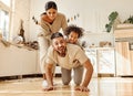 Happy multiracial family playing in kitchen Royalty Free Stock Photo