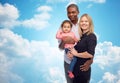 Happy multiracial family with little child
