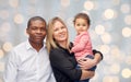 Happy multiracial family with little child Royalty Free Stock Photo