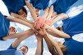 Happy Multiracial Janitors Stacking Hands Royalty Free Stock Photo