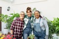 Happy multiracial women gardening together at home Royalty Free Stock Photo