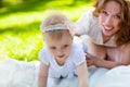 Happy mum and her Child playing in Park together Royalty Free Stock Photo