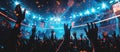 happy music fan crowd at concert at stadium, illuminated performance show, excited people dancing back view Royalty Free Stock Photo