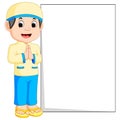 Happy muslim boy cartoon holding blank sign Royalty Free Stock Photo