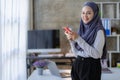 Happy Muslim businesswoman in hijab at work Smiling Arab woman working Royalty Free Stock Photo