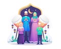 Happy Muslim Family greeting Ramadan Kareem and celebrating Eid Mubarak. Muslim people wish and greet Eid al-Fitr