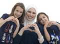 Happy Muslim Female Family, Mother and Her Daughters With Hand Gesture of Heart Love Sign Royalty Free Stock Photo