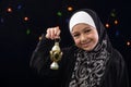 Happy Muslim Girl Celebrating with Ramadan Lantern