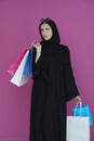 Happy muslim girl posing with shopping bags Royalty Free Stock Photo