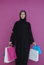 Happy muslim girl posing with shopping bags Royalty Free Stock Photo