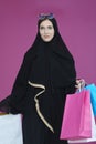 Happy muslim girl posing with shopping bags Royalty Free Stock Photo