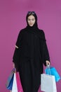 Happy muslim girl posing with shopping bags Royalty Free Stock Photo
