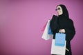 Happy muslim girl posing with shopping bags Royalty Free Stock Photo