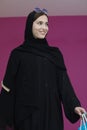 Happy muslim girl posing with shopping bags Royalty Free Stock Photo