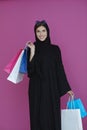 Happy muslim girl posing with shopping bags Royalty Free Stock Photo