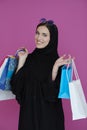 Happy muslim girl posing with shopping bags Royalty Free Stock Photo