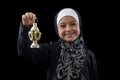 Happy Muslim Girl Smiling with Ramadan Lantern