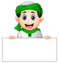 Happy muslim kid holding blank sign Royalty Free Stock Photo