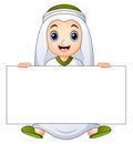 Happy muslim kid holding blank sign Royalty Free Stock Photo