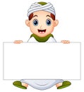 Happy muslim kid holding blank sign Royalty Free Stock Photo