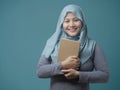 Happy Muslim Lady with Book