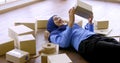 Muslim merchandiser woman holding parcel box in the office