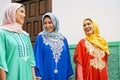 Happy muslim women walking in the city - Arabian teen girls having fun outdoor