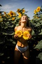 Happy Naked Blonde Woman In A Field Of Sunflowers. Royalty Free Stock Photo