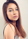 Happy natural makeup latina woman posing with long hairstyle on