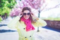 Happy natural redhead stylish woman in park toothy smile