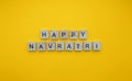 happy Navratri, minimalistic banner with an inscription in wooden letters Royalty Free Stock Photo