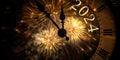 Happy New Year 2024 clock face shows New Year's Eve with fireworks in the background Royalty Free Stock Photo