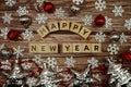 Happy New Year alphabet letter with christmas accessories on wooden background Royalty Free Stock Photo