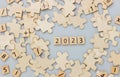 Happy New year 2023 background banner. Two thousand Twenty-Three year numbers on wooden blocks stack. wood blocks or square with n
