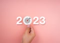 2023 Happy New year background banner. Two thousand Twenty-Three year numbers on pink background. Royalty Free Stock Photo