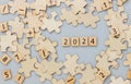 Happy New year 2024 background banner. Two thousand Twenty-Three year numbers on wooden blocks stack. wood blocks or square with n