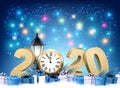 Happy 2020 New Year background with colorful presents and firework.