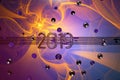 Happy New Year Banner with 2019 Numbers made by metal covered by aerography over colorful wall Background full of round Royalty Free Stock Photo