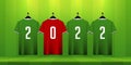 Happy New Year 2022 banner template design with soccer ball, soccer jersey or football kit on soccer field background. Royalty Free Stock Photo