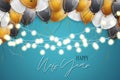 Happy New Year banner. Winter holiday celebration design concept with golden, black, and white balloons, garland lights on blue ba Royalty Free Stock Photo