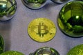 Happy New year Bitcoin trinket with Golden ribbon on wooden green background. Selective focus. Royalty Free Stock Photo