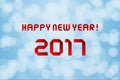 Happy new year 2017 on blue bokeh background Royalty Free Stock Photo