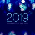 Happy new year 2019 with blue bokeh light sparkling on dark blue purple background,Holiday greeting card. Royalty Free Stock Photo